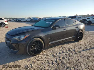 2021 Kia Stinger GT-Line with VIN KNAE15LA8M6098148, listed as a Copart auction lot 74103344 with 23,788 mi miles and Salvage Title. Bid and sale history available at carsss.com. Image 1.