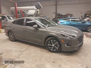 2022 Hyundai Sonata Hybrid Blue with VIN KMHL24JJ3NA048305, listed as a IAAI auction lot 41572735 with 88,085 mi miles. Bid and sale history available at carsss.com. Image 1.