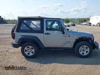 2013 Jeep Wrangler Sport with VIN 1C4AJWAG5DL639365, listed as a IAAI auction lot 40342277 with 117,109 mi miles and . Bid and sale history available at DreamBid. Image 13.