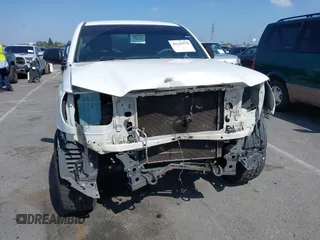 2014 Toyota Tacoma with VIN 5TFNX4CN7EX041191, listed as a IAAI auction lot 42141570 with 227,969 mi miles and . Bid and sale history available at DreamBid. Image 6.