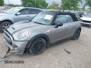 2017 MINI Convertible Cooper S with VIN WMWWG9C34H3C81035, listed as a IAAI auction lot 42216900 with 61,996 mi miles and . Bid and sale history available at DreamBid. Image 17.