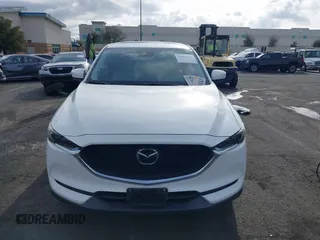 2018 Mazda CX-5 Grand Touring with VIN JM3KFADMXJ0470846, listed as a IAAI auction lot 41913533 with 54,700 mi miles and . Bid and sale history available at DreamBid. Image 13.