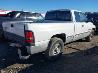 1999 Dodge Ram 1500 with VIN 1B7HC13Z3XJ580696, listed as a IAAI auction lot 41311605 with 244,120 mi miles. Bid and sale history available at carsss.com. Image 4.