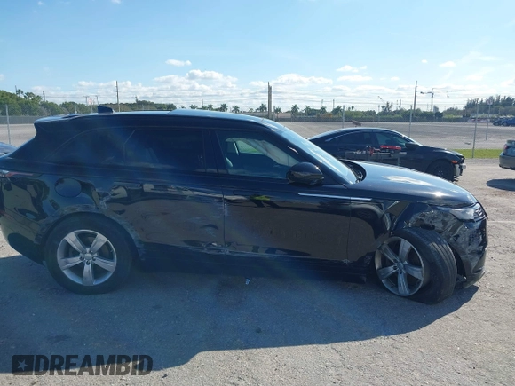 2020 Land Rover Range Rover Velar S z VIN SALYB2EX3LA286674, wystawiony jako IAAI lot #41507765 z przebiegiem 44 911 mil mil oraz . Historia ofert i sprzedaży dostępna na DreamBid. Obrazek 13.