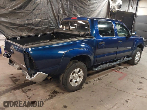 2014 Toyota Tacoma with VIN 3TMLU4EN4EM156933, listed as a IAAI auction lot 41197904 with 128,183 mi miles. Bid and sale history available at carsss.com. Image 4.