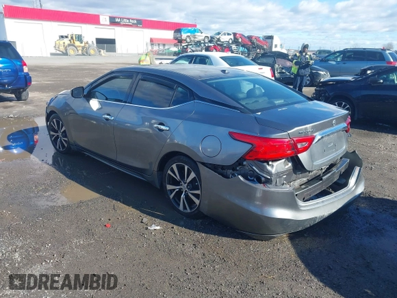 2016 Nissan Maxima Platinum with VIN 1N4AA6AP7GC409949, listed as a IAAI auction lot 41214746 with 190,853 mi miles and . Bid and sale history available at DreamBid. Image 3.