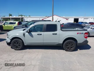 2022 Ford Maverick XL with VIN 3FTTW8F91NRA44015, listed as a IAAI auction lot 41811415 with 47,558 mi miles and . Bid and sale history available at DreamBid. Image 14.