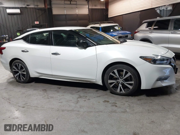 2018 Nissan Maxima SV with VIN 1N4AA6AP7JC406251, listed as a IAAI auction lot 41786523 with 117,403 mi miles and . Bid and sale history available at DreamBid. Image 12.