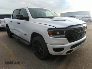 2023 Ram 1500 Laramie with VIN 1C6SRFJT0PN542147, listed as a IAAI auction lot 41773807 with 41,206 mi miles and . Bid and sale history available at DreamBid. Image 1.
