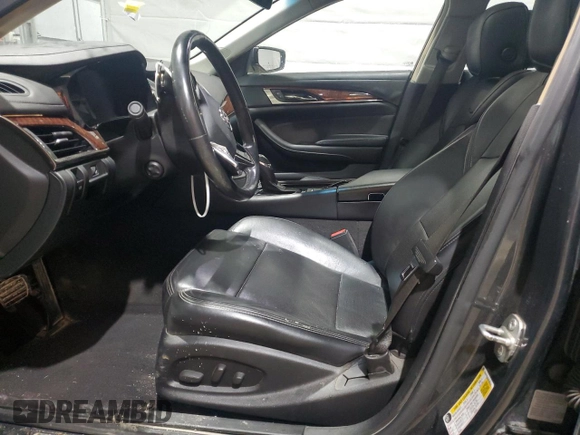 2014 Cadillac CTS Luxury AWD z VIN 1G6AX5SX5E0185132, wystawiony jako Copart lot #52292465 z przebiegiem 69 344 mil mil oraz Szkoda całkowita • Salvage title. Historia ofert i sprzedaży dostępna na DreamBid. Obrazek 7.