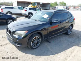 2014 BMW X1 sDrive28i with VIN WBAVM1C51EVW51040, listed as a IAAI auction lot 41956856 with 1 mi miles. Bid and sale history available at carsss.com. Image 2.