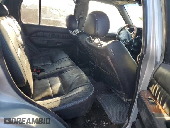2002 Infiniti QX4 Luxury z VIN JNRDR09Y82W261103, wystawiony jako Copart lot #72452414 z przebiegiem 256 625 mil mil oraz Szkoda całkowita • Salvage title. Historia ofert i sprzedaży dostępna na DreamBid. Obrazek 10.