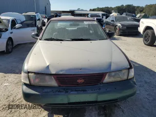 1996 Nissan Sentra XE z VIN 3N1AB41D3TL027288, wystawiony jako Copart lot #77255804 z przebiegiem 132 033 mil mil oraz Czysty tytuł • Clean title. Historia ofert i sprzedaży dostępna na DreamBid. Obrazek 5.