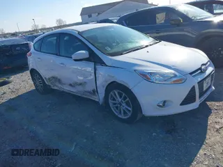 2012 Ford Focus SE z VIN 1FAHP3K29CL265135, wystawiony jako IAAI lot #40989480 z przebiegiem 158 742 mil mil oraz . Historia ofert i sprzedaży dostępna na DreamBid. Obrazek 1.