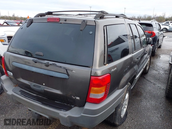 2000 Jeep Grand Cherokee Laredo with VIN 1J4GW48N2YC187623, listed as a IAAI auction lot 41311495 with 121,831 mi miles and . Bid and sale history available at DreamBid. Image 4.