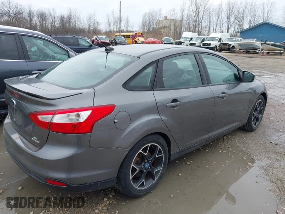 2012 Ford Focus SE with VIN 1FAHP3F21CL415006, listed as a IAAI auction lot 42073643 with 168,516 mi miles. Bid and sale history available at carsss.com. Image 4.