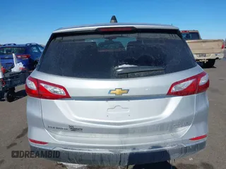 2018 Chevrolet Equinox LT z VIN 2GNAXSEV9J6350260, wystawiony jako IAAI lot #41625613 z przebiegiem 75 317 mil mil oraz . Historia ofert i sprzedaży dostępna na DreamBid. Obrazek 16.