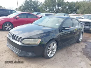 2014 Volkswagen Jetta Sedan SE w/Connectivity with VIN 3VWD07AJ5EM382349, listed as a IAAI auction lot 41533366 with 165,466 mi miles. Bid and sale history available at carsss.com. Image 2.