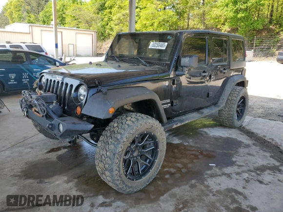 2011 Jeep Wrangler Unlimited Sport with VIN 1J4HA3H19BL574932, listed as a Copart auction lot 53250465 with 113,344 mi miles and Salvage Title. Bid and sale history available at carsss.com. Image 1.