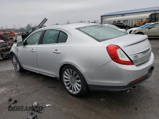 2015 Lincoln MKS with VIN 1LNHL9EK5FG607404, listed as a Copart auction lot 43246995 with Not provided miles and Salvage title. Bid and sale history available at DreamBid. Image 2.