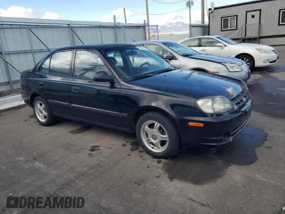 2003 Hyundai Accent GL with VIN KMHCG45C43U429167, listed as a Copart auction lot 79658124 with 80,926 mi miles and Clean Title. Bid and sale history available at carsss.com. Image 4.