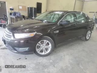 2014 Ford Taurus SEL z VIN 1FAHP2E80EG128686, wystawiony jako Copart lot #57158255 z przebiegiem 69 529 mil mil oraz Szkoda całkowita • Salvage title. Historia ofert i sprzedaży dostępna na DreamBid. Obrazek 1.