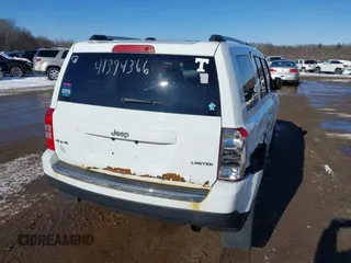2014 Jeep Patriot Limited with VIN 1C4NJRCB5ED634120, listed as a IAAI auction lot 41394366 with 139,859 mi miles. Bid and sale history available at carsss.com. Image 4.