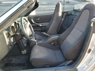 2001 Toyota MR2 z VIN JTDFR320410036287, wystawiony jako Copart lot #73851984 z przebiegiem Nie podano mil oraz Szkody całkowita. Historia ofert i sprzedaży dostępna na DreamBid. Obrazek 7.
