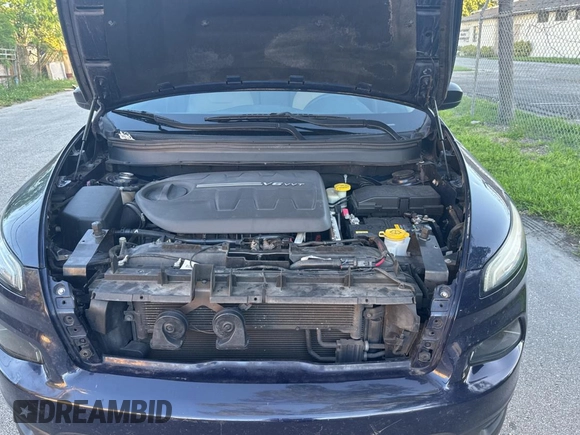 2016 Jeep Cherokee Altitude with VIN 1C4PJLAS7GW208431, listed as a Copart auction lot 61501525 with 126,107 mi miles and Salvage title. Bid and sale history available at DreamBid. Image 7.