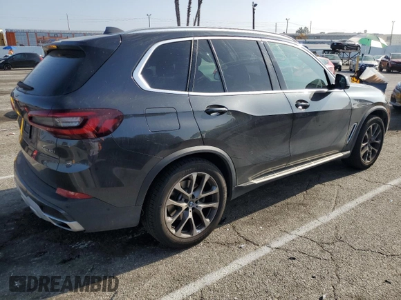 2022 BMW X5 xDrive40i with VIN 5UXCR6C02N9N18226, listed as a Copart auction lot 50031523 with 13,907 mi miles. Bid and sale history available at carsss.com. Image 3.