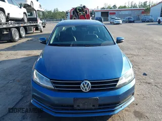 2016 Volkswagen Jetta Sedan 1.4T SE with VIN 3VWD67AJ0GM328412, listed as a IAAI auction lot 41556254 with 137,814 mi miles. Bid and sale history available at carsss.com. Image 12.