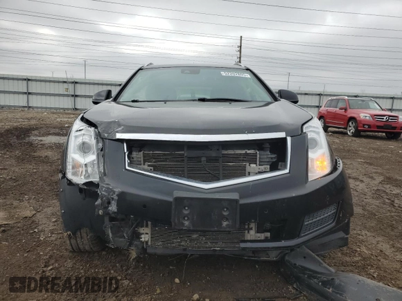 2014 Cadillac SRX Luxury Collection z VIN 3GYFNEE34ES685593, wystawiony jako Copart lot #52202805 z przebiegiem 139 869 mil mil oraz Szkoda całkowita • Salvage title. Historia ofert i sprzedaży dostępna na DreamBid. Obrazek 5.