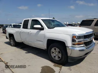 2018 Chevrolet Silverado 1500 LT with VIN 1GCRCREH9JZ312364, listed as a Copart auction lot 51332665 with 137,368 mi miles and Salvage Title. Bid and sale history available at DreamBid. Image 4.