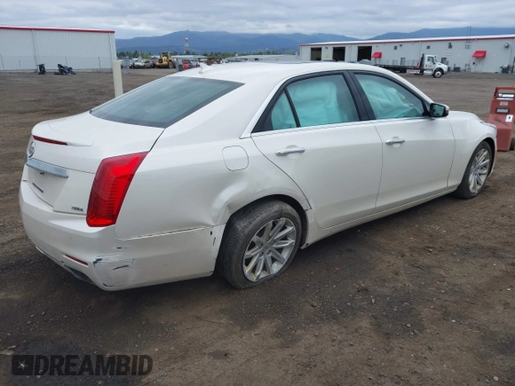 2014 Cadillac CTS Luxury AWD with VIN 1G6AX5S3XE0184524, listed as a IAAI auction lot 42260852 with 139,667 mi miles and . Bid and sale history available at DreamBid. Image 4.
