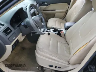 2012 Ford Fusion SEL z VIN 3FAHP0JG4CR388483, wystawiony jako Copart lot #57391805 z przebiegiem 184 665 mil mil oraz Szkoda całkowita • Salvage title. Historia ofert i sprzedaży dostępna na DreamBid. Obrazek 7.