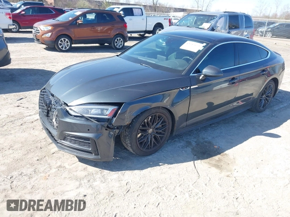 2018 Audi A5 Sportback Premium Plus with VIN WAUENCF53JA132769, listed as a IAAI auction lot 42037673 with 128,040 mi miles. Bid and sale history available at carsss.com. Image 2.