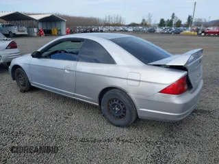 2003 Honda Civic LX with VIN 1HGEM21593L008943, listed as a IAAI auction lot 41662938 with 286,705 mi miles and . Bid and sale history available at carsss.com. Image 3.