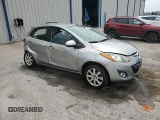 2013 Mazda 2 Touring z VIN JM1DE1LZ5D0162425, wystawiony jako Copart lot #59033595 z przebiegiem 225 932 mil mil oraz Szkoda całkowita • Salvage title. Historia ofert i sprzedaży dostępna na DreamBid. Obrazek 4.