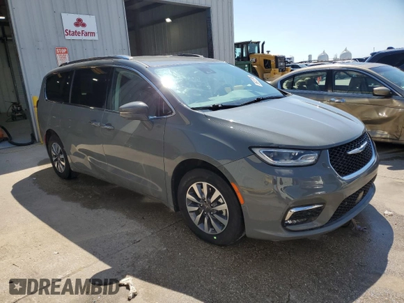 2021 Chrysler Pacifica Hybrid Touring L with VIN 2C4RC1L72MR599413, listed as a Copart auction lot 56419875 with 108,986 mi miles and Salvage title. Bid and sale history available at DreamBid. Image 4.