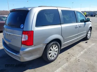 2013 Chrysler Town & Country Touring with VIN 2C4RC1BG9DR777819, listed as a IAAI auction lot 41824692 with 138,702 mi miles. Bid and sale history available at carsss.com. Image 4.