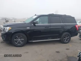 2021 Ford Expedition XLT with VIN 1FMJU1JT7MEA71014, listed as a IAAI auction lot 41219835 with 93,725 mi miles. Bid and sale history available at carsss.com. Image 14.