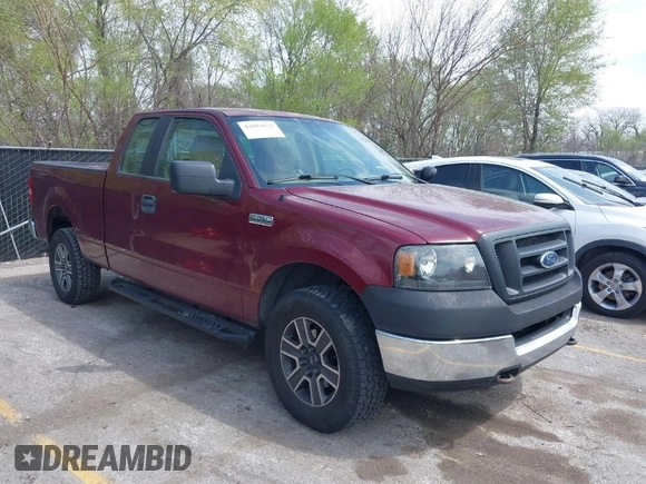 2005 Ford F-150 XLT with VIN 1FTPX14575KD79404, listed as a IAAI auction lot 42003073 with 212,050 mi miles. Bid and sale history available at carsss.com. Image 1.