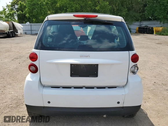 2010 Smart fortwo Pure с VIN WMEEJ3BA4AK399691, выставлен на аукционе Copart как лот 60283245 с пробегом 172 584 миль миль и Чистый • Clean title. История ставок и продаж доступна на DreamBid. Изображение 6.