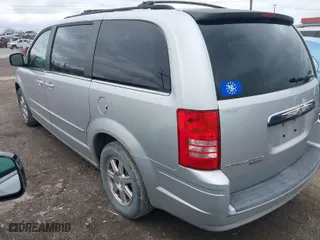 2008 Chrysler Town & Country Touring with VIN 2A8HR54P18R611579, listed as a IAAI auction lot 41909066 with 106,143 mi miles. Bid and sale history available at carsss.com. Image 3.