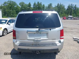 2010 Honda Pilot Touring z VIN 5FNYF4H94AB010058, wystawiony jako IAAI lot #42495313 z przebiegiem 157 306 mil mil oraz . Historia ofert i sprzedaży dostępna na DreamBid. Obrazek 13.