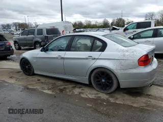 2007 BMW 3 Series 328xi with VIN WBAVC93517KZ71576, listed as a Copart auction lot 53523475 with 185,028 mi miles and Salvage title. Bid and sale history available at DreamBid. Image 2.