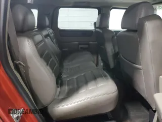 2003 Hummer H2 z VIN 5GRGN23U03H113929, wystawiony jako Copart lot #49540455 z przebiegiem 126 254 mil mil oraz Tytuł czysty. Historia ofert i sprzedaży dostępna na DreamBid. Obrazek 11.