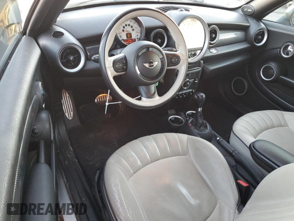 2013 MINI Coupe S z VIN WMWSX3C53DT466665, wystawiony jako Copart lot #79497824 z przebiegiem 94 767 mil mil oraz Szkoda całkowita • Salvage title. Historia ofert i sprzedaży dostępna na DreamBid. Obrazek 8.