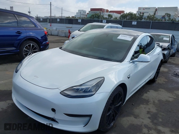 2020 Tesla Model 3 Long Range with VIN 5YJ3E1EB9LF795246, listed as a IAAI auction lot 41895750 with 163,061 mi miles and . Bid and sale history available at DreamBid. Image 2.
