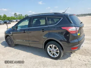 2017 Ford Escape SE z VIN 1FMCU0GD2HUC07371, wystawiony jako Copart lot #59223875 z przebiegiem 26 805 mil mil oraz Szkoda całkowita • Salvage title. Historia ofert i sprzedaży dostępna na DreamBid. Obrazek 2.